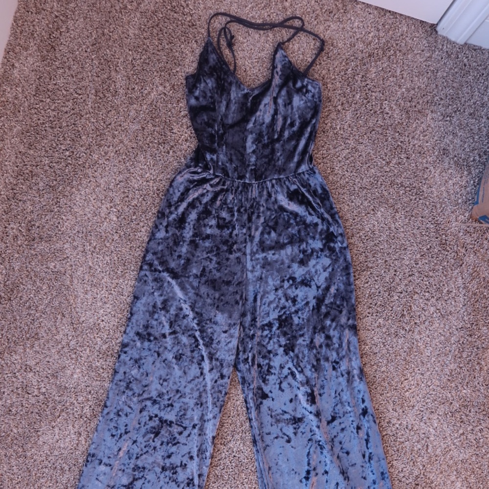 Never worn velvet jumpsuit. Size small